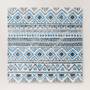 Quebra-cabeça Azul étnico, fundo sem costura branco.
