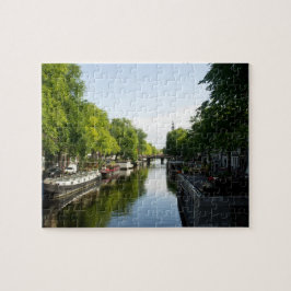 Quebra-cabeça Barcos de casa no canal de Amsterdão