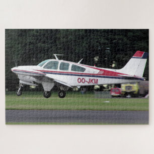 Quebra-cabeça Beechcraft Bonanza OO-JKM - Aeroporto de Kemble
