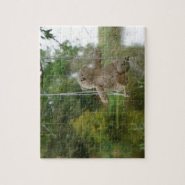 Quebra-cabeça Beertje op schommel aan boom