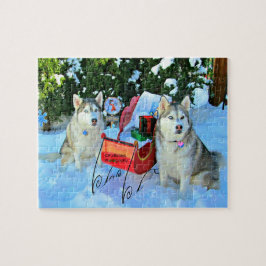 Quebra-cabeça Belos Huskies siberianos na neve