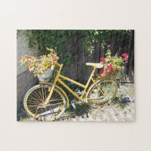 Quebra-cabeça Bicicleta amarela da flor na rua