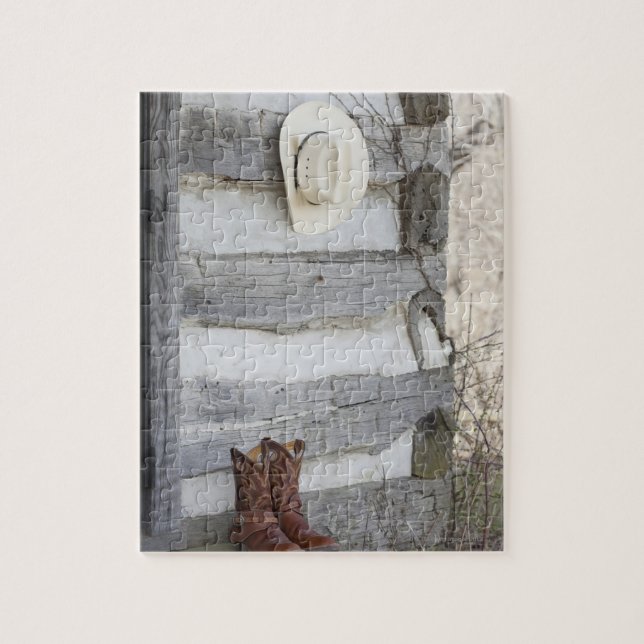 Quebra-cabeça Botas de cowboy e chapéu fora da cabana (Vertical)