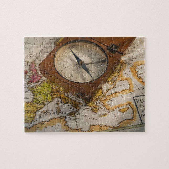 Quebra-cabeça Bússola antiga no mapa (Horizontal)