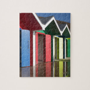 Quebra-cabeça Cabanas de praia amarelas coloridas e vermelhas   