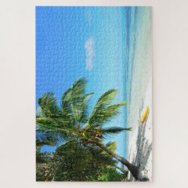 Quebra-cabeça Caiaque amarelo em uma praia branca com palma