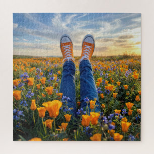 Quebra-cabeça Calças jeans e tênis laranja entre flores
