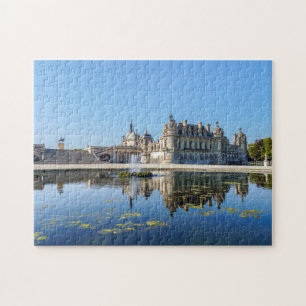 Quebra-cabeça Chateau de Chantilly com reflexão em um lago