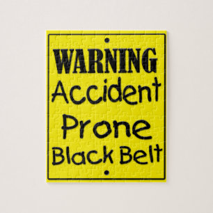 Quebra-cabeça Cinto Preto de Pedra Acidente