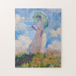 Quebra-cabeça Claude Monet - Mulher com Parasol virada para a es
