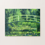 Quebra-cabeça Claude Monet: Ponte sobre uma lagoa de lírios de<br><div class="desc">Um quebra-cabeça clássico maravilhoso que caracteriza uma ponte sobre uma lagoa de lírios de água,  pintada pelo pintor impressionista francês Claude Monet.</div>