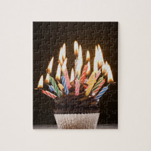 Quebra-cabeça Cupcake com velas do aniversário
