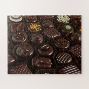 Quebra-cabeça da foto dos doces de chocolate