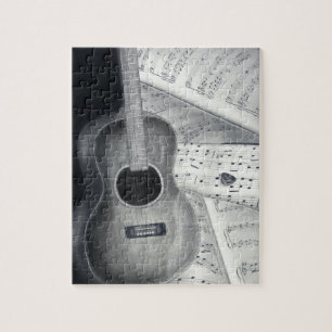 Quebra-cabeça da guitarra & da partitura