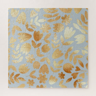 Quebra-cabeça Douradas flores, fundo azul, imitação de folhas.