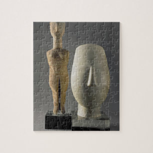 Quebra-cabeça (Estatueta com braços cruzados, Cycladic de Lto