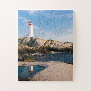 Quebra-cabeça Farol em Rochas com Reflexo Oceânico