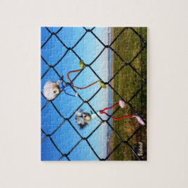 Quebra-cabeça Fubby's die een hek beklimmen.