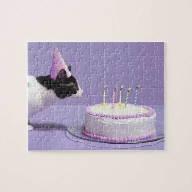 Quebra-cabeça Gato vestindo chapéu de aniversário soprando velas (Horizontal)