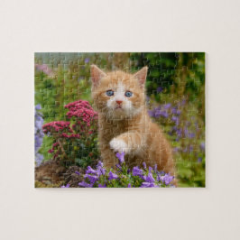 Quebra-cabeça Ginger kitten em um jardim