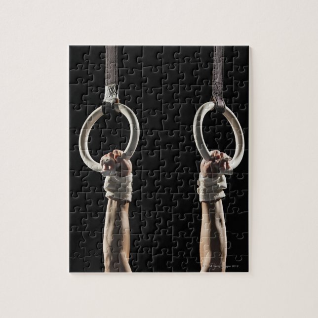 Quebra-cabeça Gymnast balançando de anéis 2 (Vertical)