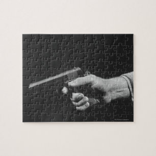 Quebra-cabeça Homem que guardara a arma