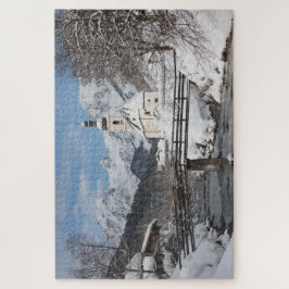 Quebra-cabeça Igreja na neve com montanhas alpes no inverno