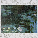 Quebra-cabeça Lírios de Claude Monet, Vintage Fine Art<br><div class="desc">Lírios de Claude Monet é uma pintura típica de arte do impressionismo vintage que apresenta lírios em um lago no jardim de Monet em sua casa em Giverny, França. Os salgueiros chorões lançam um reflexo no lago. Claude Monet gostava de pintar "en plein air" ou "ao ar livre". Uma série...</div>