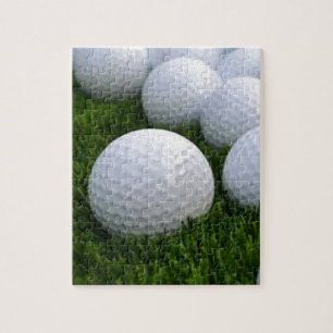 Quebra-cabeça Lotes das bolas de golfe na grama