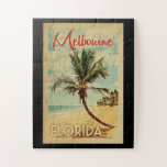 Quebra-cabeça Melbourne Palm Viagens vintage<br><div class="desc">Um impressão de arte moderna Melbourne Florida,  do século médio,  exclusivamente retrógrado,  no estilo de poster viagens vintage. Ele apresenta uma palmeira curva na praia arenosa com oceano sob um céu azul nublado.</div>