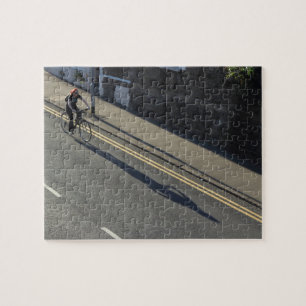 Quebra-cabeça Menina numa Bicicleta
