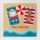 Quebra-cabeça Merry Christmas Tropical Beach Papais noeis Reinde<br><div class="desc">Este design de feriados moderno mostra Papai Noel e sua rena tirando férias de praia tropical. #natal #feriados #sazonal #festivo #papais noeis #santaclaus #praia #reindeer #feriado #tropical #férias #areia #mar #fatherchristmas #xmas #moderno #diversão #humor #jigsen #jigsawpuzzle #quebra-cabeça #legal #presentes #natristmasgifts #holidaygifts #stock ffers #secretsanta</div>