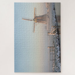 Quebra-cabeça Moinho de vento e uma cerca durante um nascer do