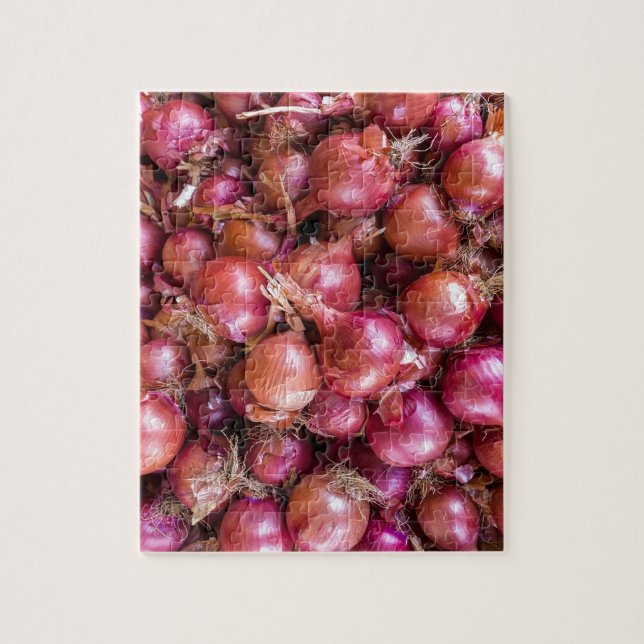 Quebra-cabeça Montão de cebolas vermelhas no mercado (Vertical)