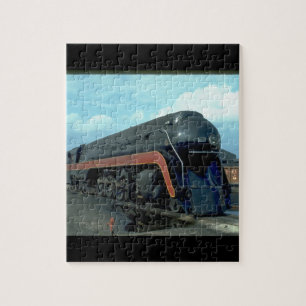 Quebra-cabeça N&W 4-8-4 #611. (trem; céu; nuvens; trilha;)