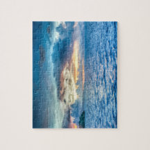 Oceano/mar do por do sol