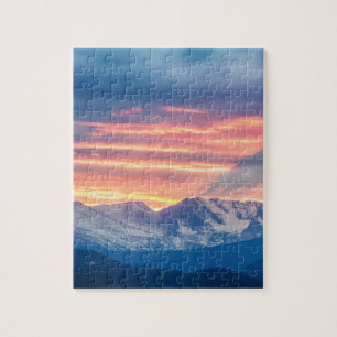 Quebra-cabeça Ondas do por do sol da montanha rochosa de