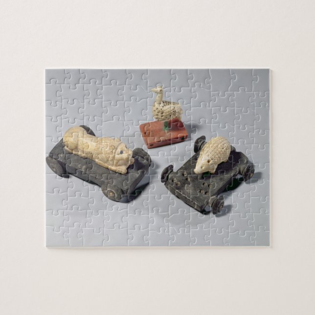 Quebra-cabeça Os brinquedos das crianças: um ouriço, um leão e (Horizontal)