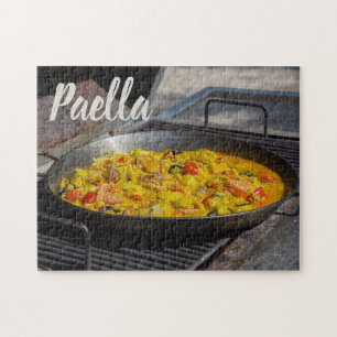 Quebra-cabeça Paella é cozida em um presente de chef