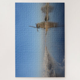 Quebra-cabeça Paisagem do inverno com moinho de vento e gelo