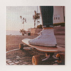Quebra-cabeça patinagem na praia