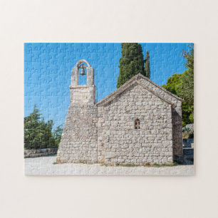 Quebra-cabeça Pequena igreja na colina Marjan perto de Split - C