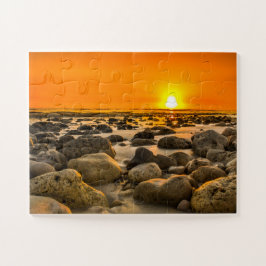 Quebra-cabeça Pôr do sol na praia rochosa
