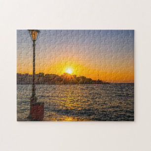 Quebra-cabeça Pôr do sol sobre o porto veneziano, Chania, Creta