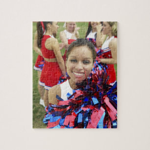 Quebra-cabeça Retrato de um Cheerleader em frente a um Grupo de