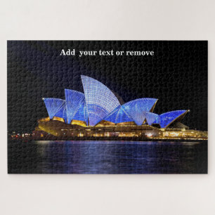 Quebra-cabeça Sydney Opera House acendeu à noite, Austrália,