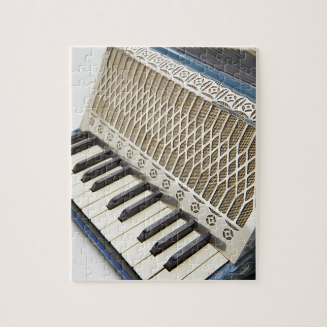 Quebra-cabeça Teclado Acordeão antigo (Vertical)