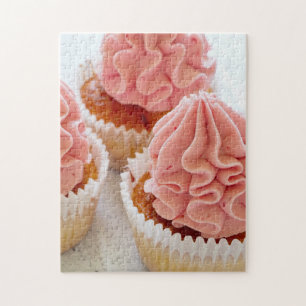 Quebra-cabeça Um Cupcake doce de tratamento com Glacé rosa