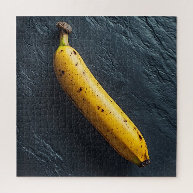 Quebra-cabeça Uma Banana em uma Superfície Escura (Vertical)