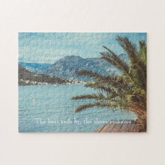 Quebra-cabeça Uma paisagem com montanhas e uma palmeira